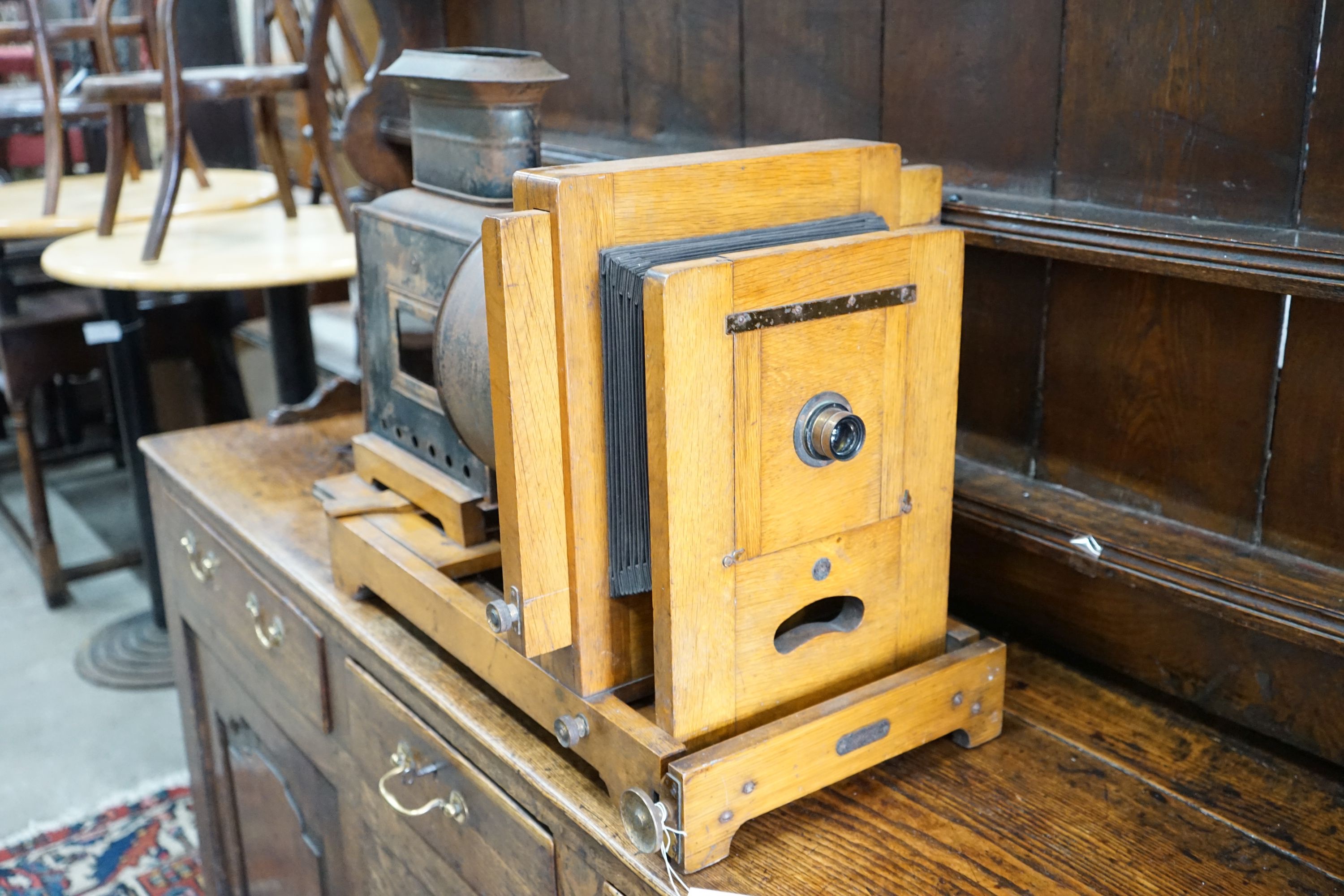 A Victorian oak magic lantern converted to electricity